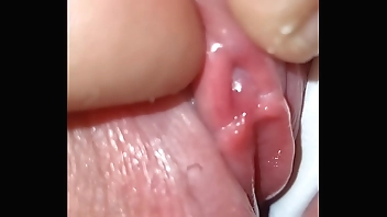 Hiden behind her gorgeous cameltoe I found her tiny clit I play with till she cums