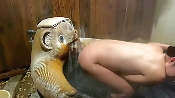 With the mouth of a raccoon.