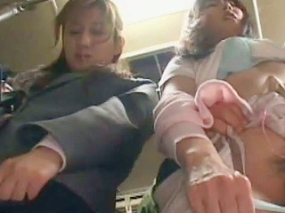 Sexy Japanese teen gets her nipples played with while sucking cock in public.